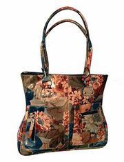 100% Argentinean Floral Leather Slimline Shoulder Bag For $195