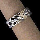 Solid Sterling Silver & 18kt Gold 'Love Knot' Ring Band For $125